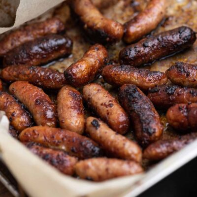 Pork Sausages, Marinated In Raspberry & Mustard Dressing