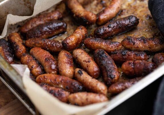 Pork Sausages, Marinated In Raspberry & Mustard Dressing